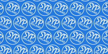 A blue background featuring a repeating pattern of the white SYP Ireland roundel.