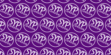 A dark purple background featuring a repeating pattern of the white SYP London roundel.