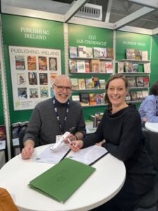 Alun Ceri Jones of Dalen and Karin van Zeieten of Mercis Publishing BV, Amsterdam, signing contracts at the London Book Fair 2023 for Dalen’s forthcoming Miffy graphic novel titles in Irish. 